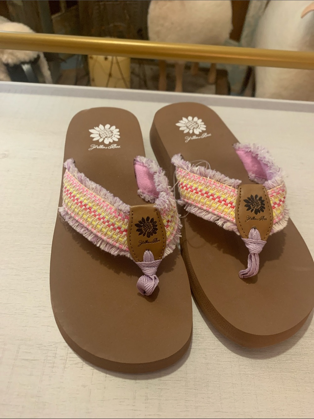 Yellow Box Pink & Yellow Woven Fringe Flip Flop Sandals